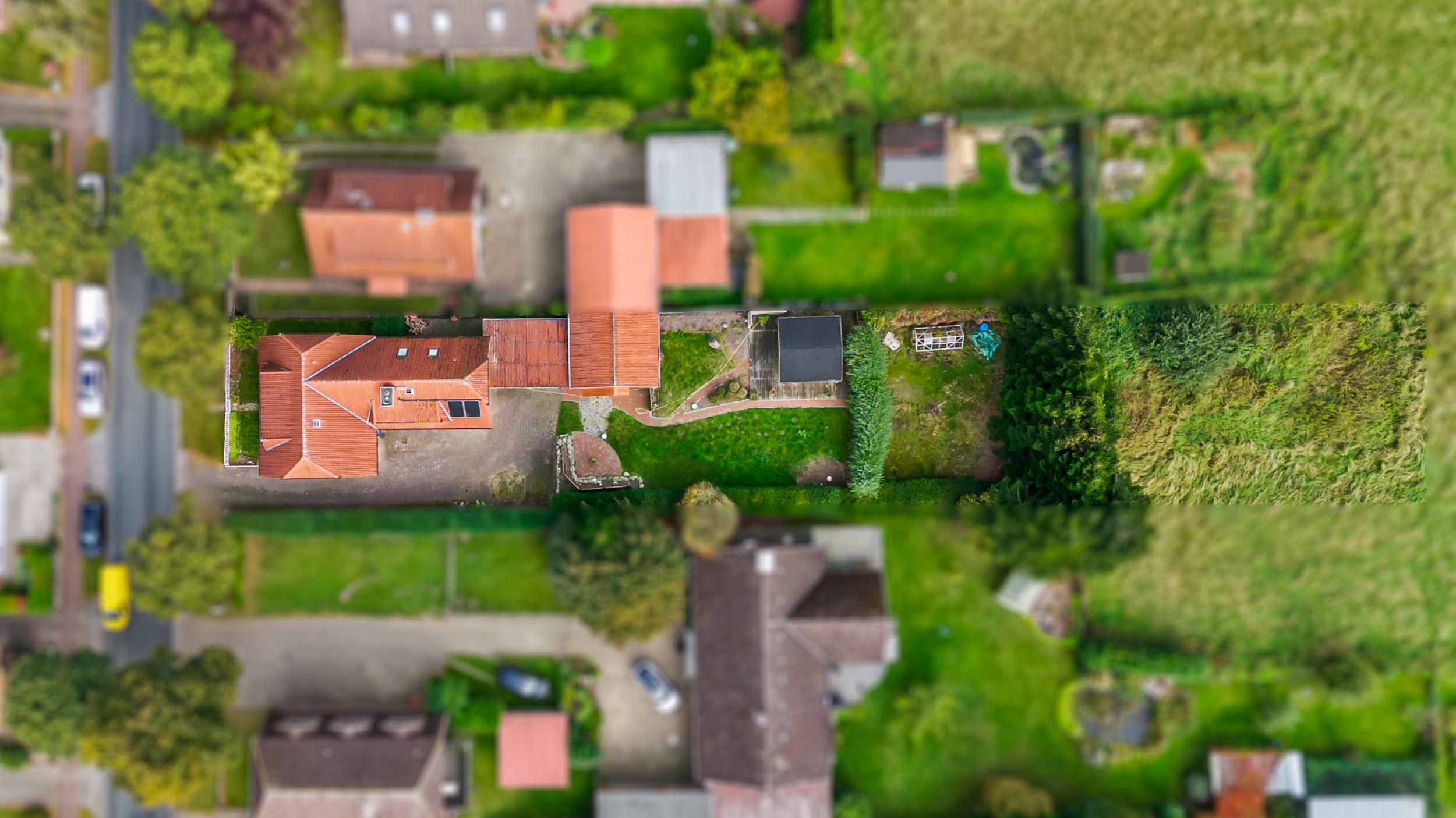 Schiffdorf - Modernisiertes Einfamilienhaus mit zusätzlichem Bauland - Luftaufnahme - Objekt mit Bau- u. Weideland