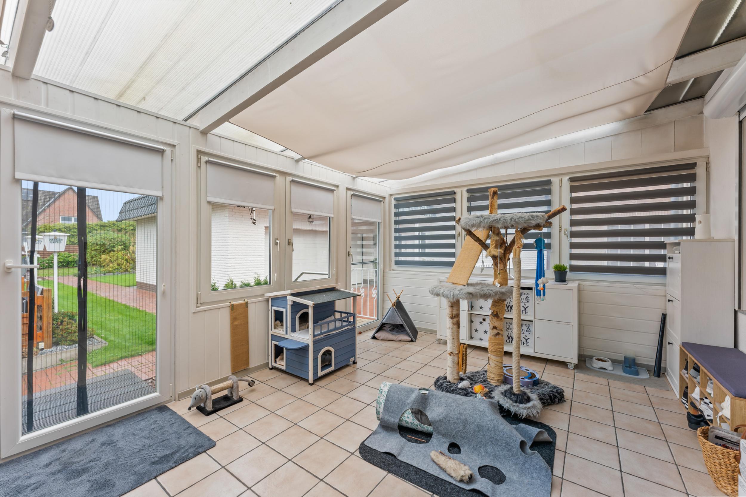 Schiffdorf-Spaden - Modernisiertes Einfamilienhaus mit Einliegerwohnung in ruhiger Lage - Wintergarten