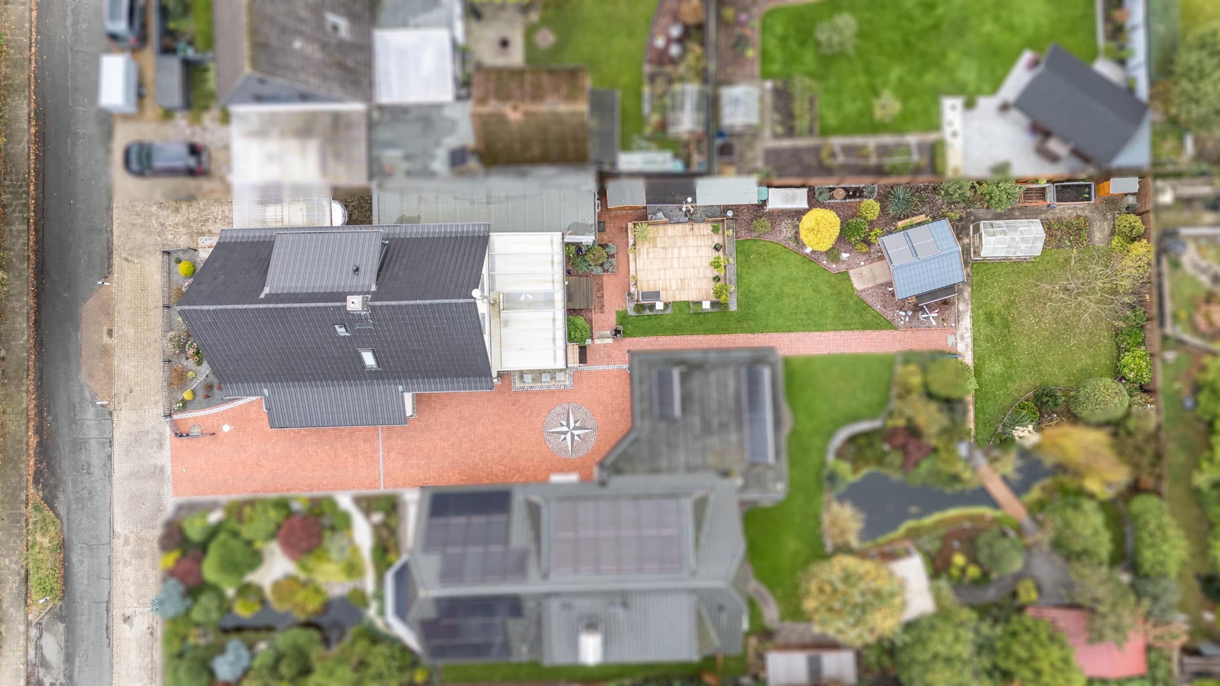 Schiffdorf-Spaden - Modernisiertes Einfamilienhaus mit Einliegerwohnung in ruhiger Lage - Vogelperspektive