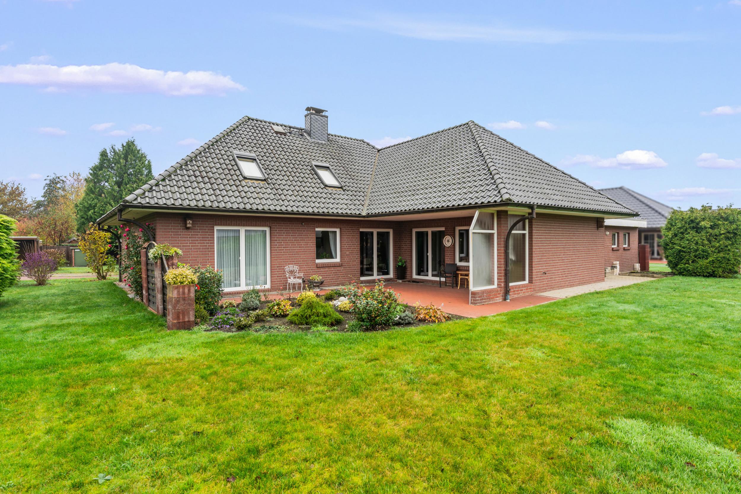 Bokel - Repräsentativer Winkelbungalow in ruhiger Wohnlage – ein Zuhause zum Wohlfühlen - Rückansicht