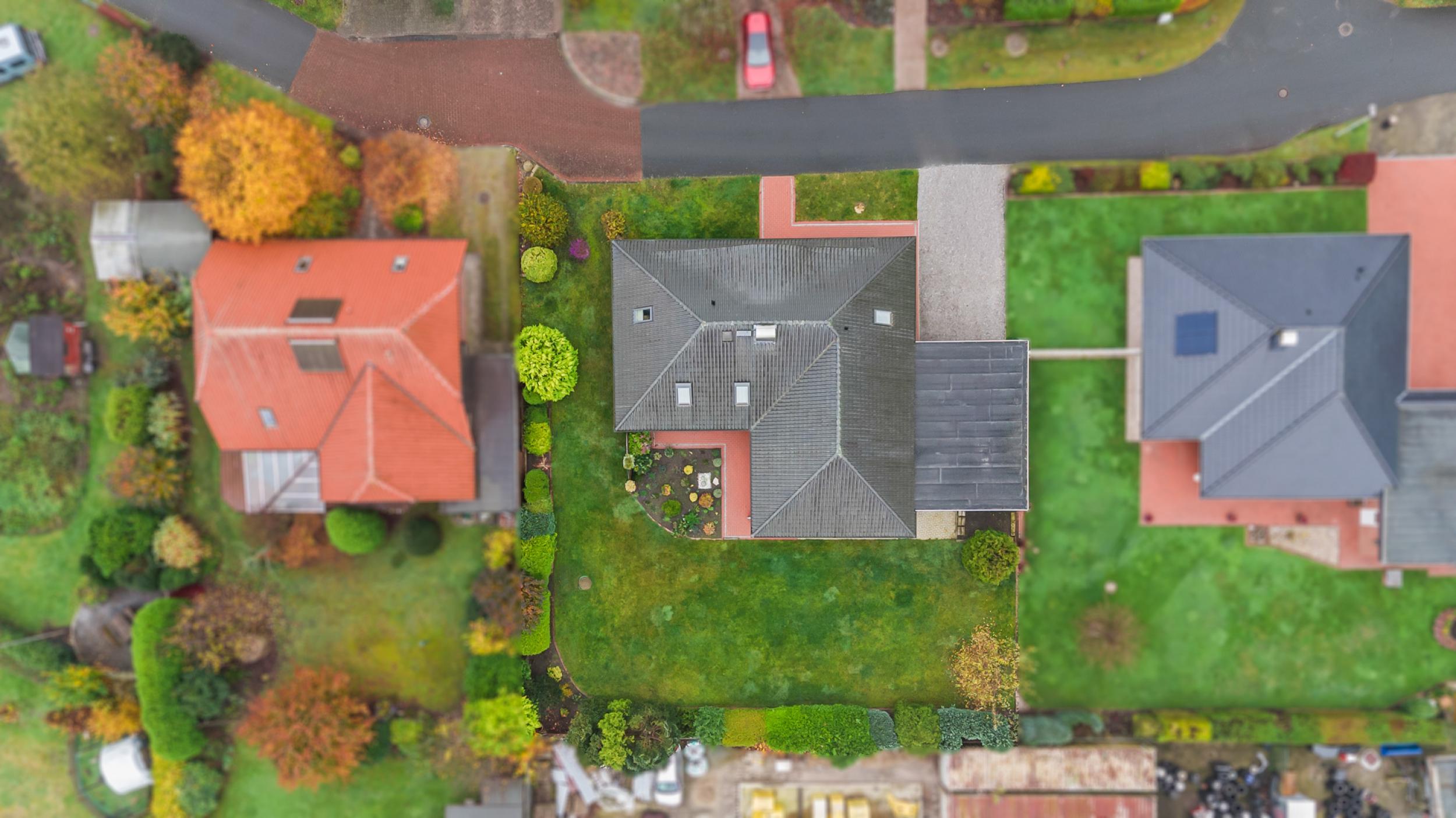 Bokel - Repräsentativer Winkelbungalow in ruhiger Wohnlage – ein Zuhause zum Wohlfühlen - Vogelperspektive