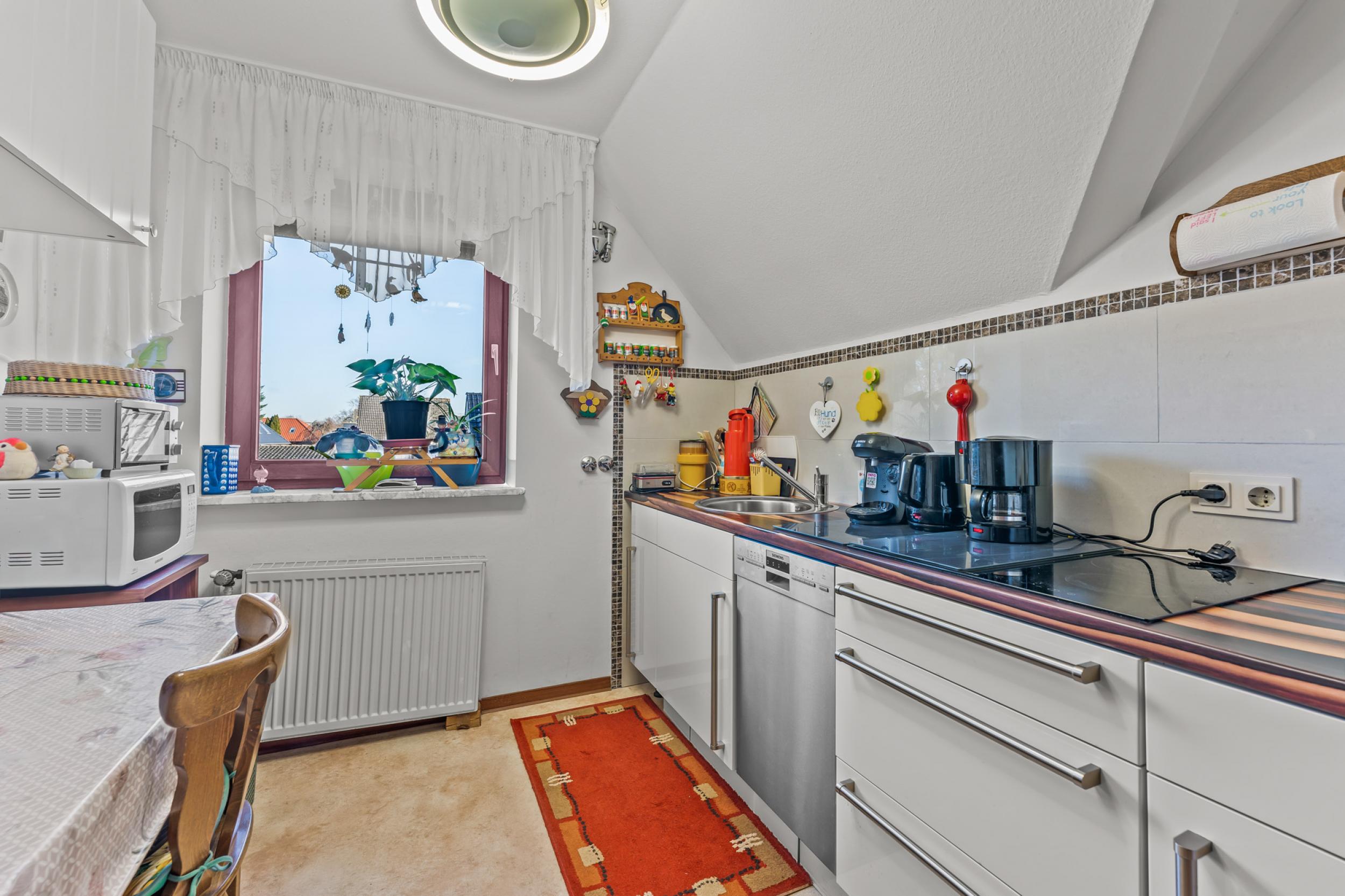 Sahlenburg - Ein- bis Zweifamilienhaus in attraktiver Lage - Küche Dachgeschoss