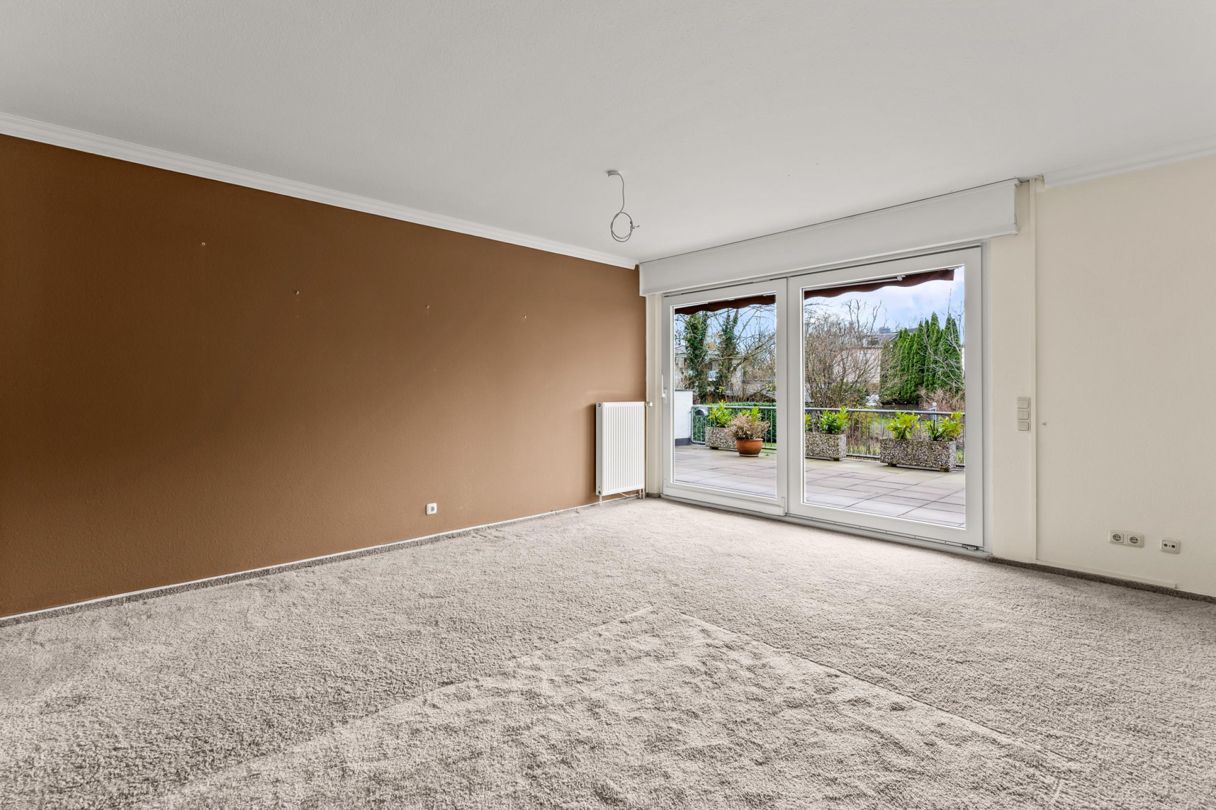 Burglesum - Attraktive Hochparterrewohnung mit großer Sonnenterrasse - Wohnzimmer