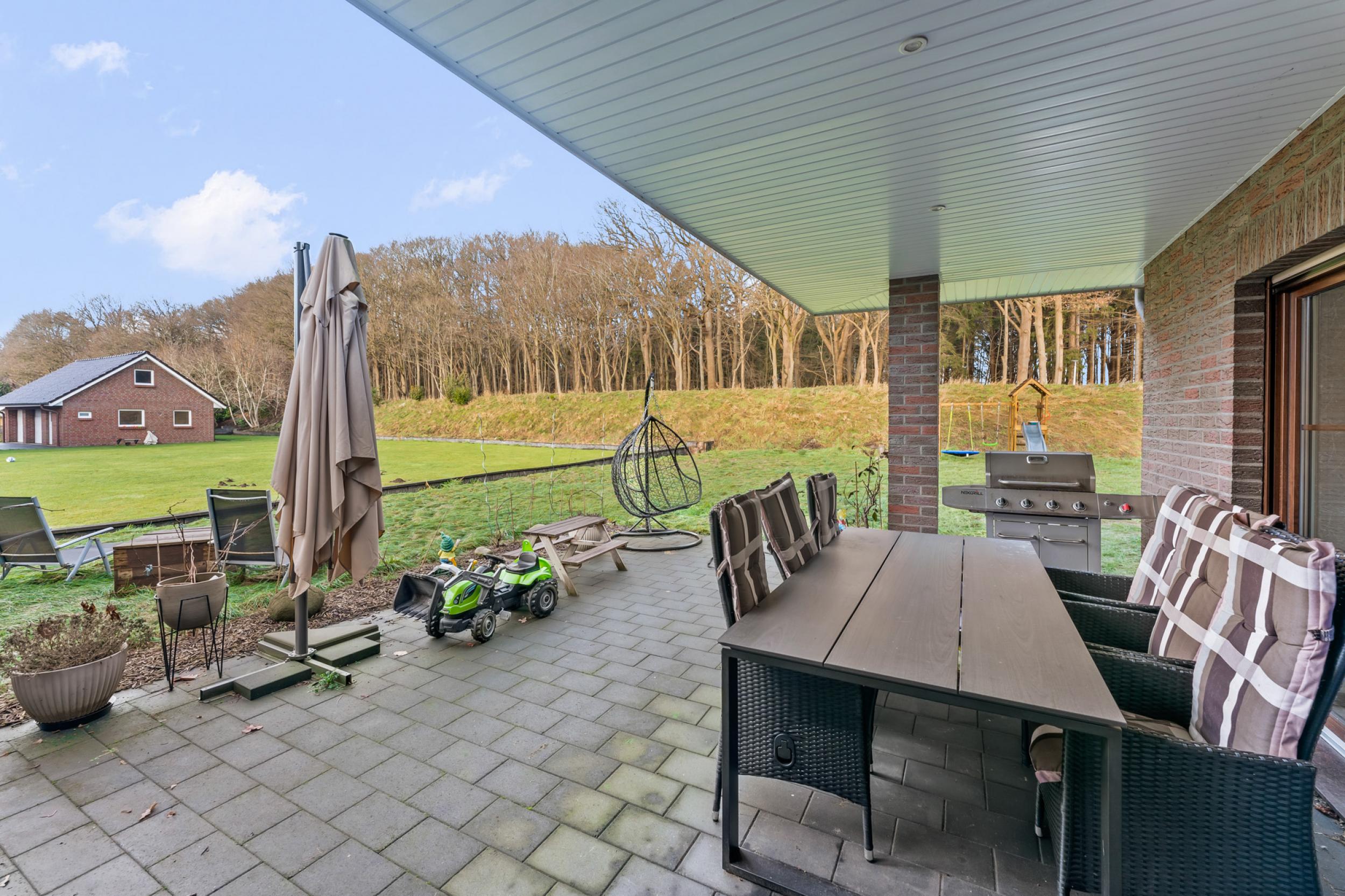 Beverstedt - Moderner Winkelbungalow in ländlicher Lage mit Außbaupotenzial - Terrasse