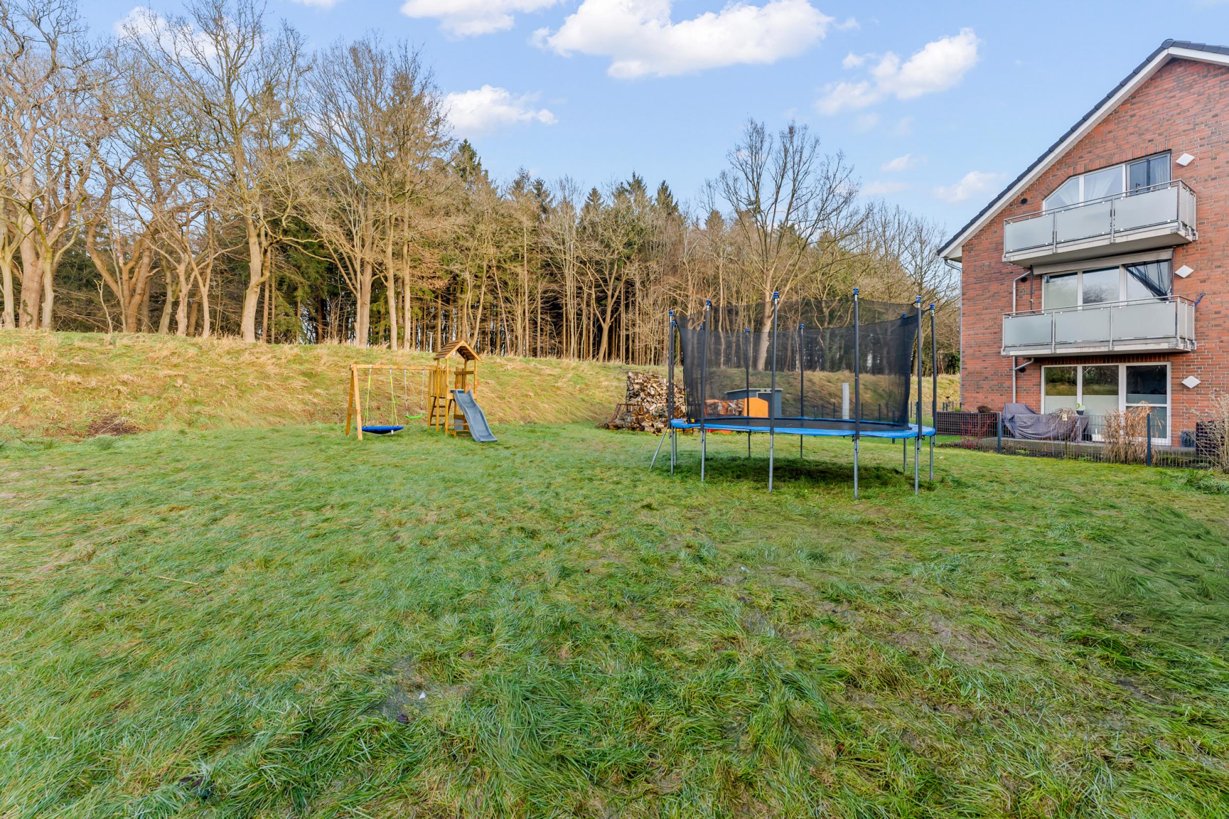 Beverstedt - Moderner Winkelbungalow in ländlicher Lage mit Außbaupotenzial - Garten