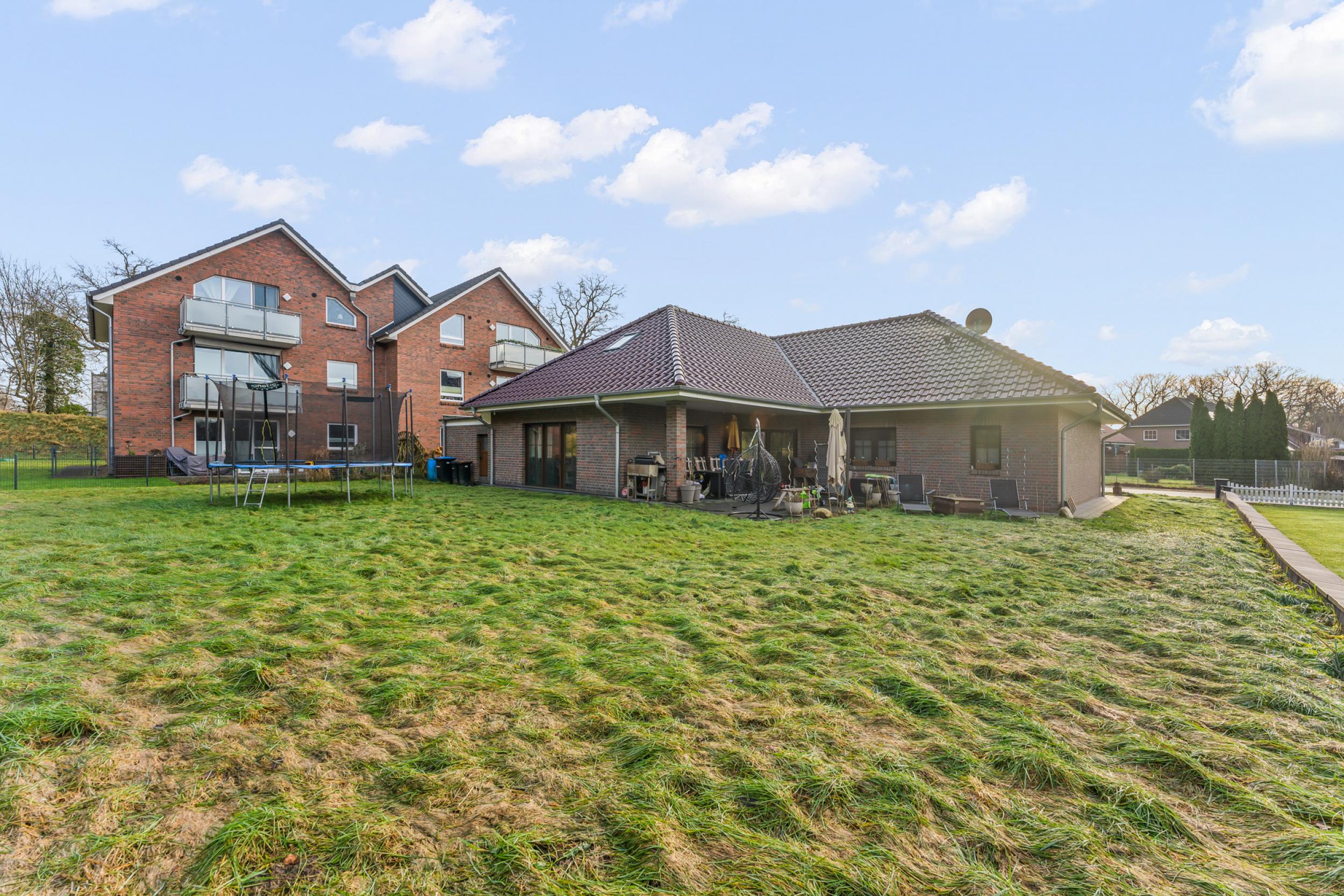 Beverstedt - Moderner Winkelbungalow in ländlicher Lage mit Außbaupotenzial - Rückansicht