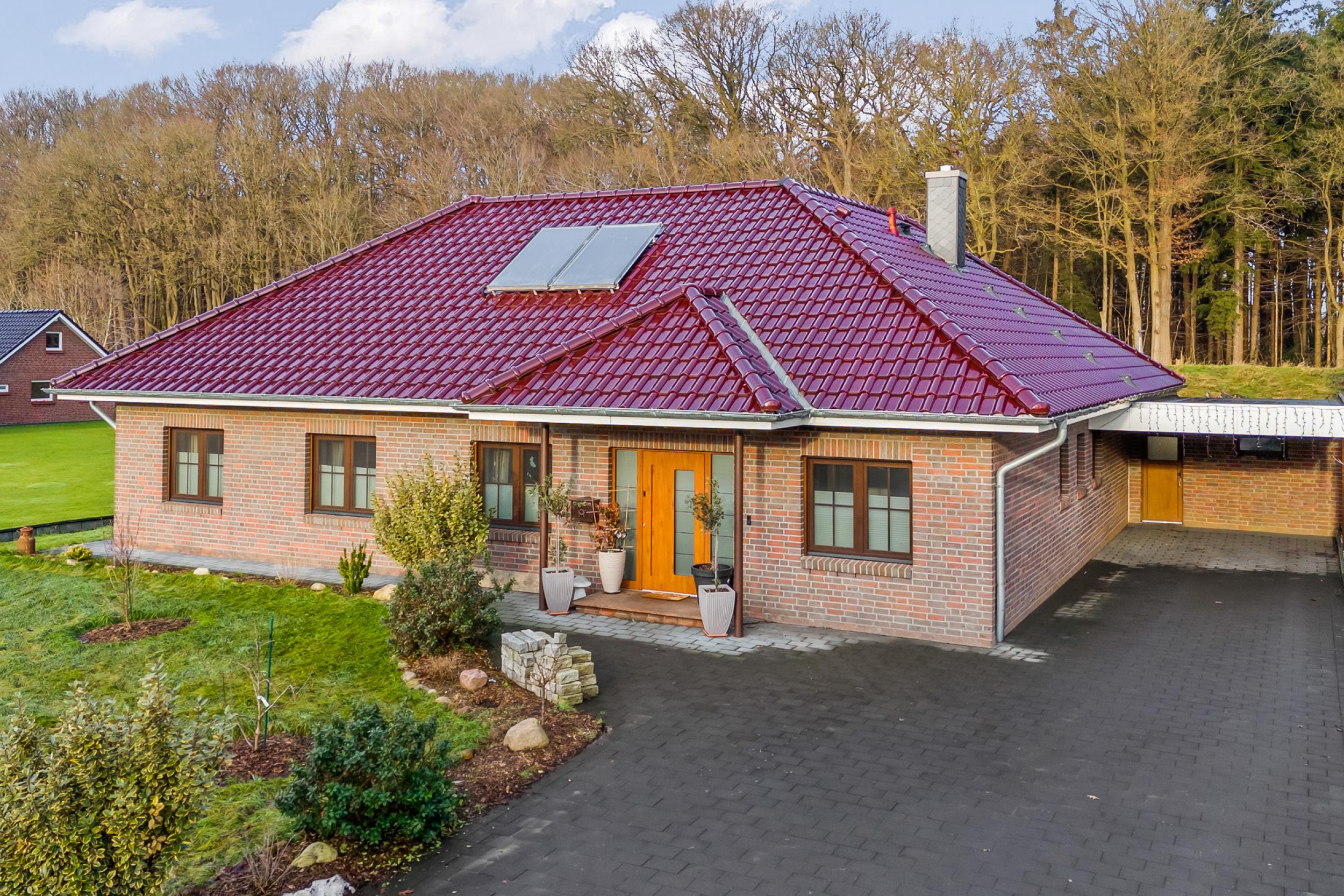 Beverstedt - Moderner Winkelbungalow in ländlicher Lage mit Außbaupotenzial - Frontansicht