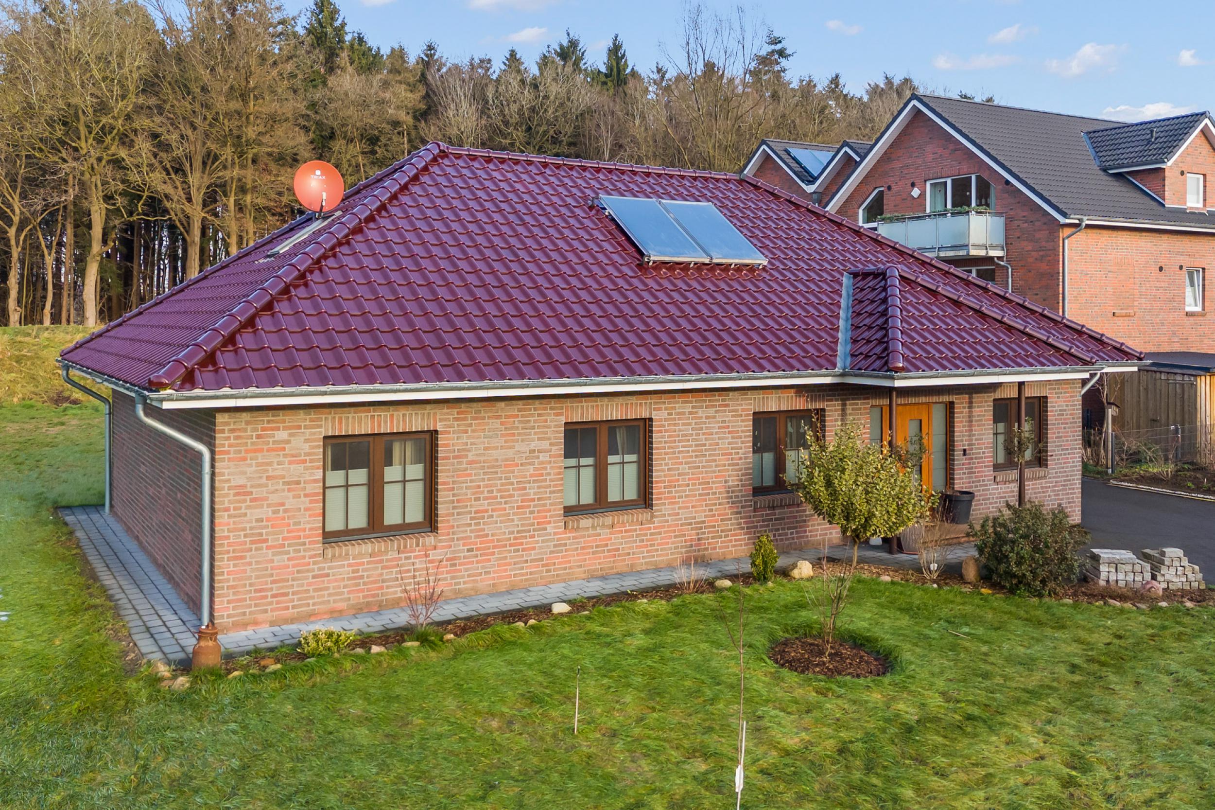 Beverstedt - Moderner Winkelbungalow in ländlicher Lage mit Außbaupotenzial - Frontansicht