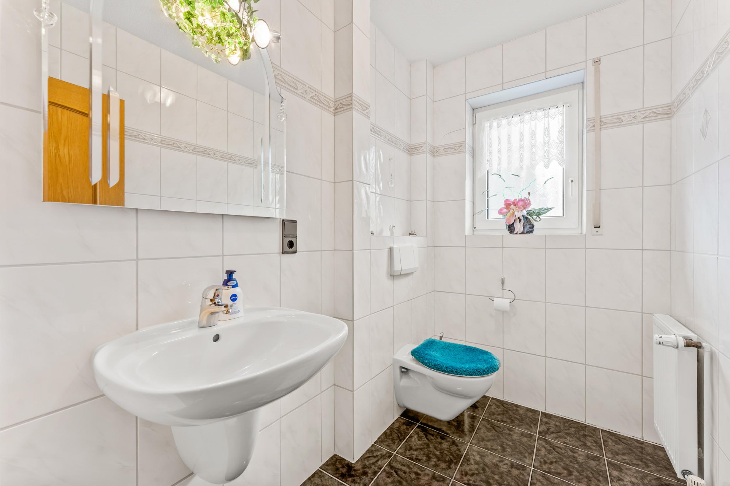 Beverstedt - Repräsentativer Winkelbungalow in ruhiger Wohnlage – ein Zuhause zum Wohlfühlen - Gäste-WC