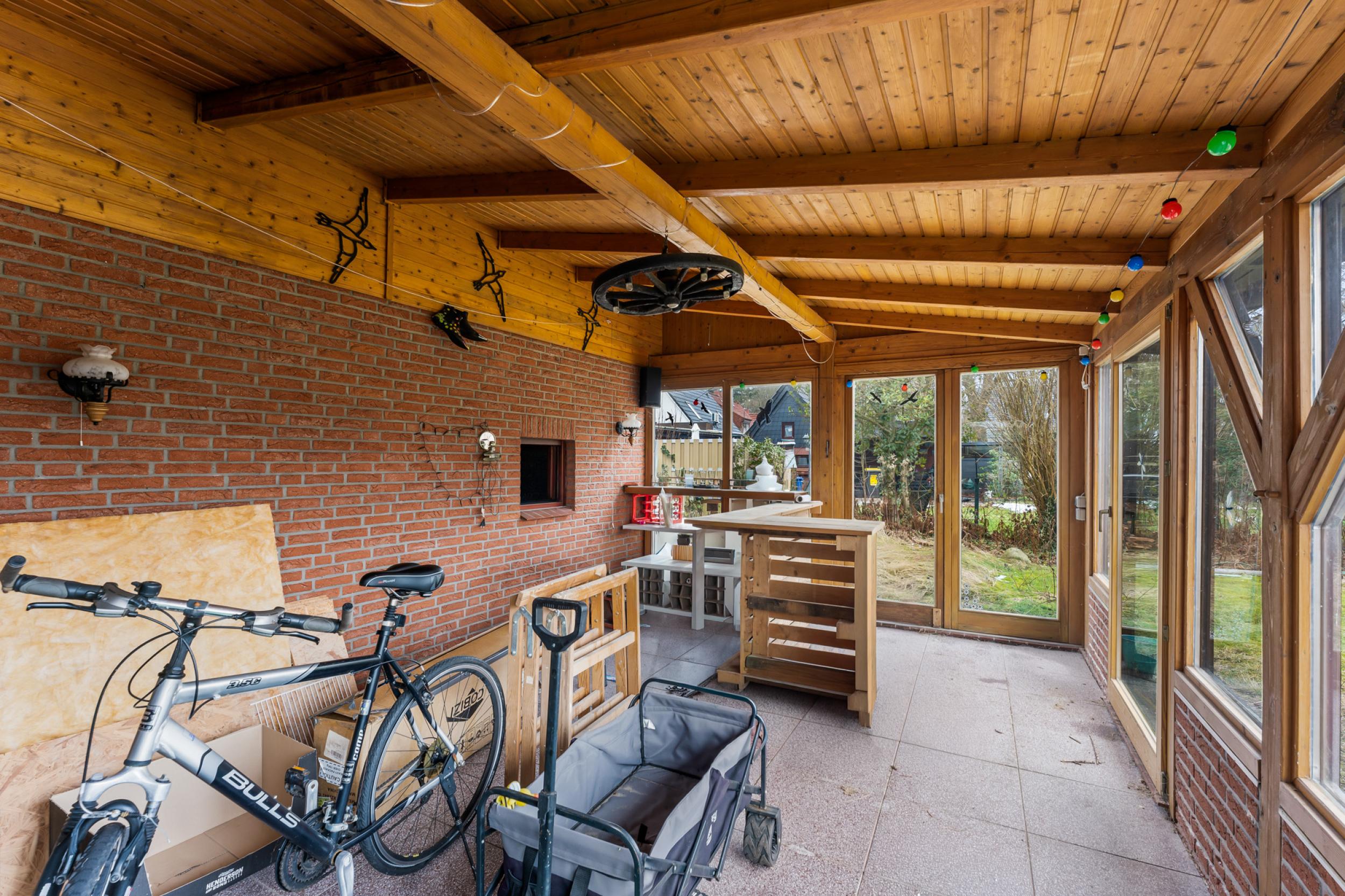 Surheide - Charmante Doppelhaushälfte mit Nebengelass und großem Grundstück - Wintergarten