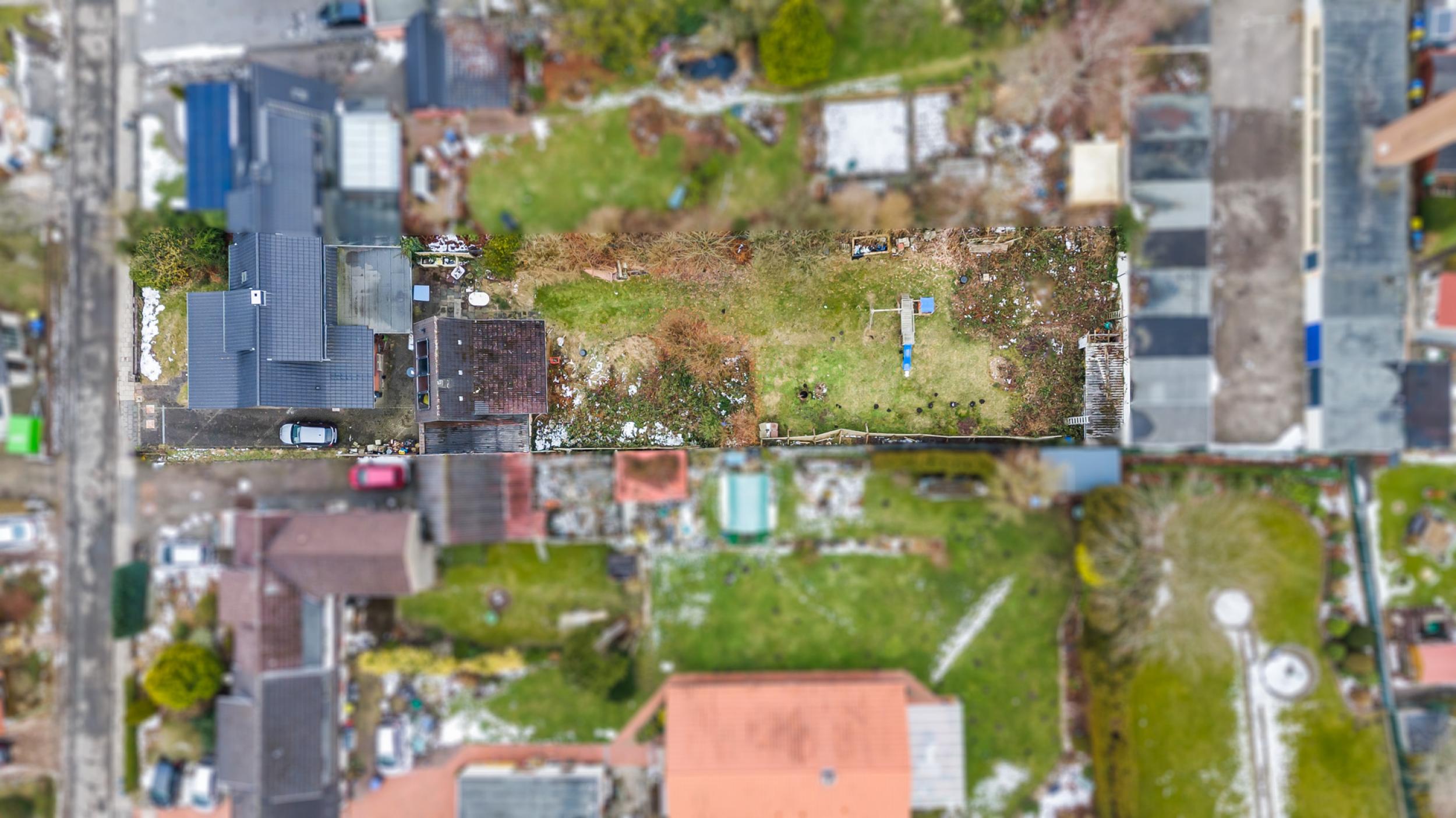 Surheide - Charmante Doppelhaushälfte mit Nebengelass und großem Grundstück - Vogelperspektive