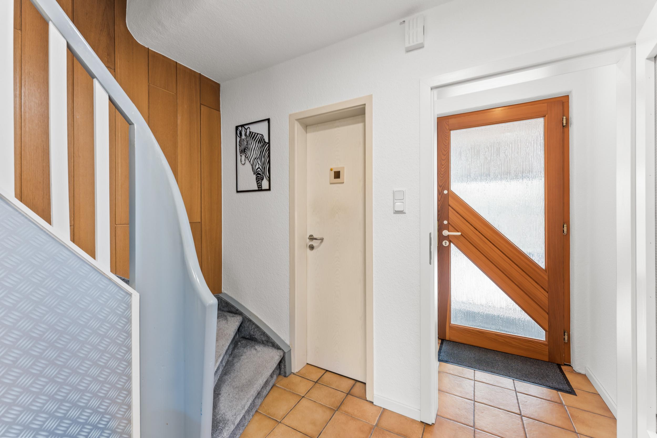 Speckenbüttel - Geräumige Doppelhaushälfte in Parknähe - Eingangsbereich