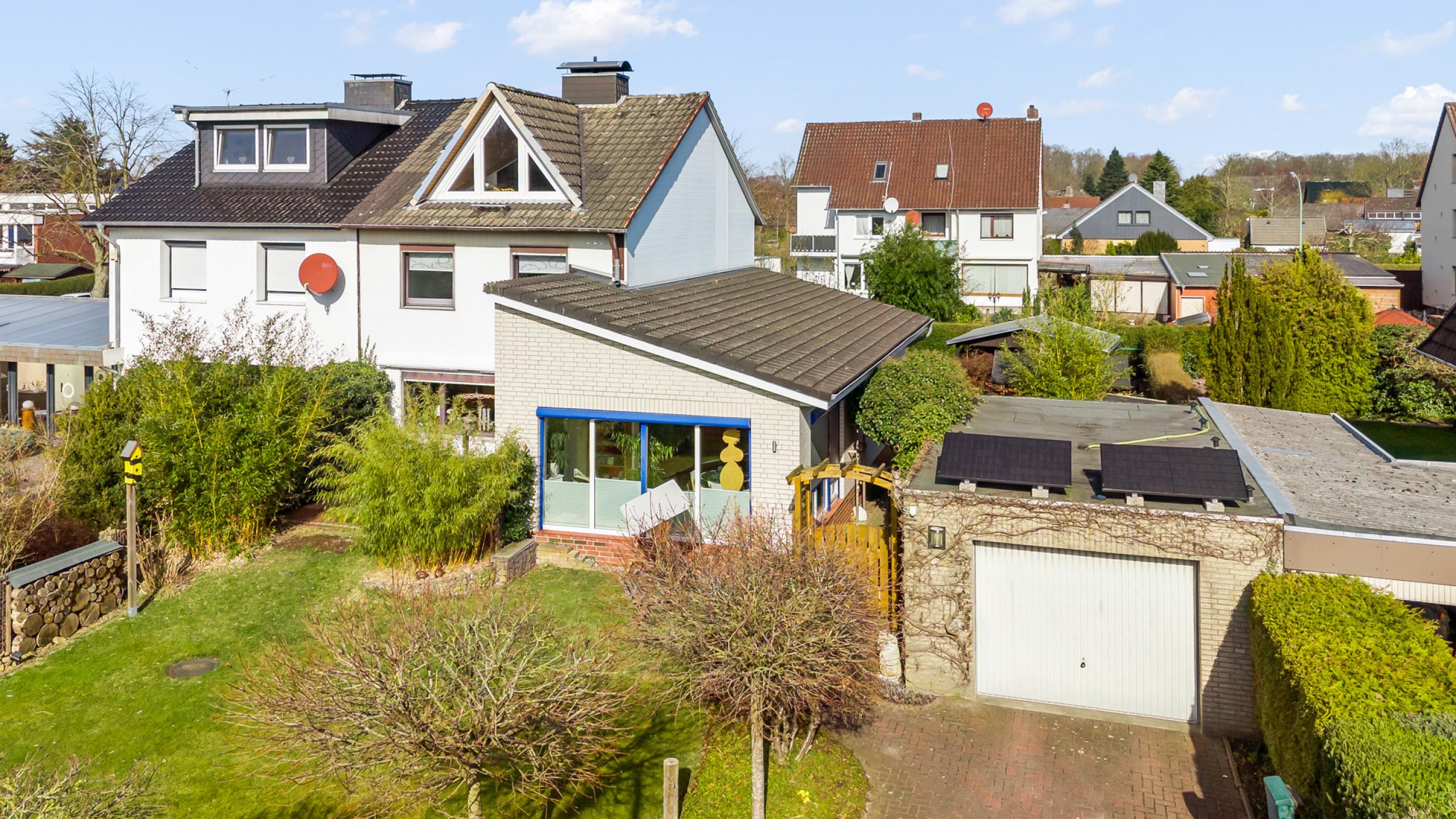 Speckenbüttel - Geräumige Doppelhaushälfte in Parknähe - Frontansicht