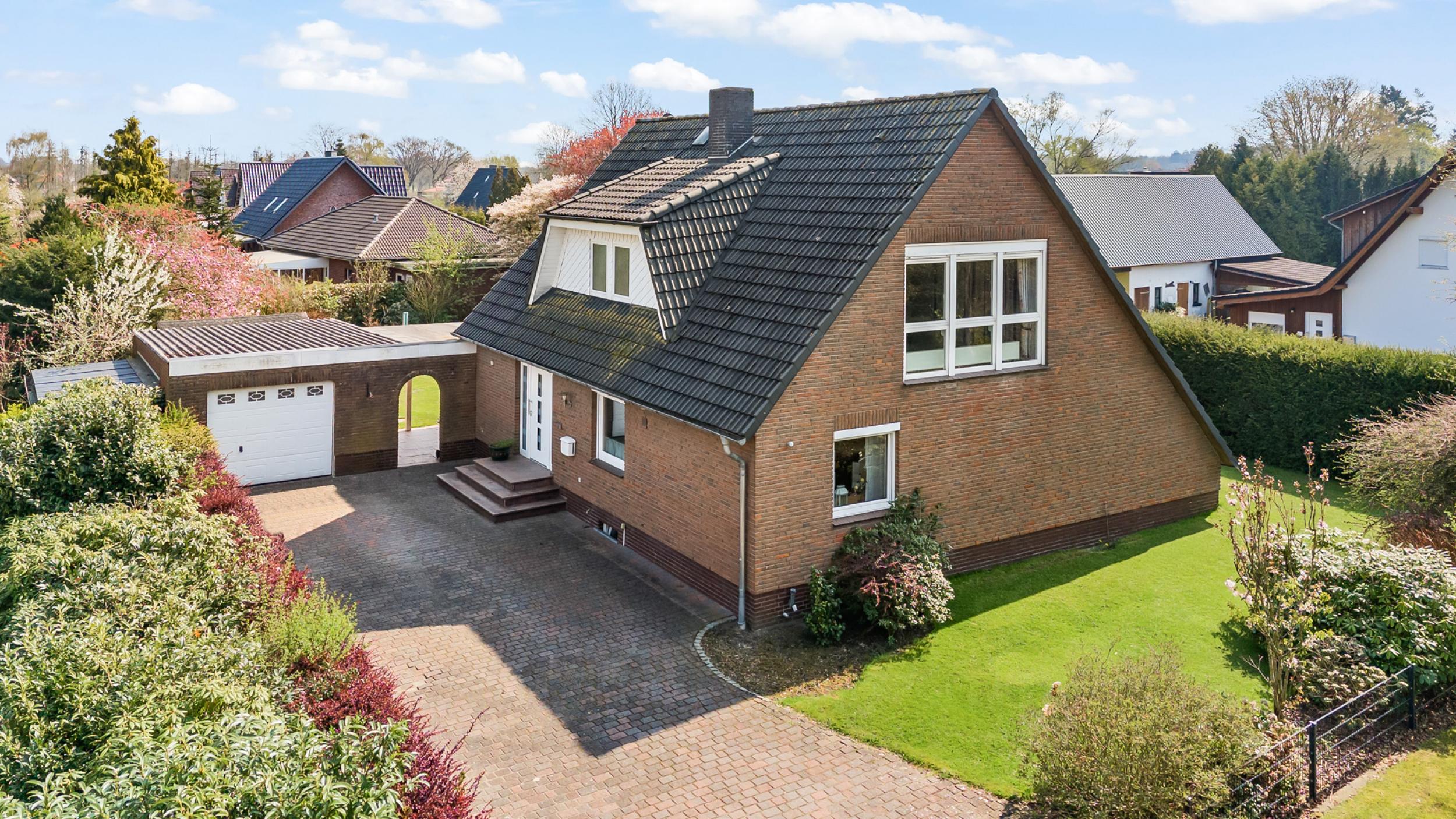 Schiffdorf - Familienfreundliches Einfamilienhaus in traumhafter Lage - Titelbild