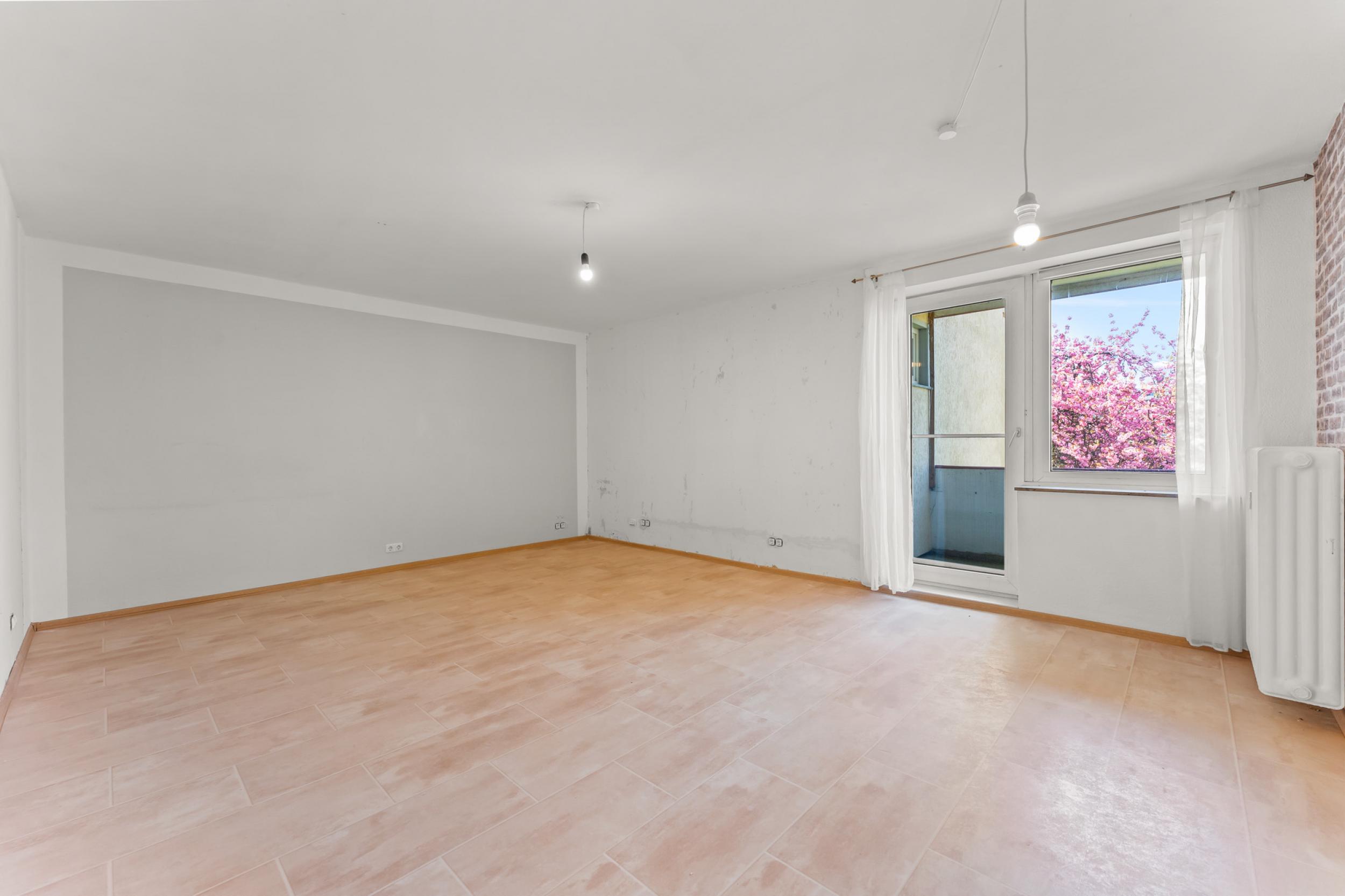 Klushof - Solide 3-Zimmereigentumswohnung in zentraler Lage - Wohnzimmer