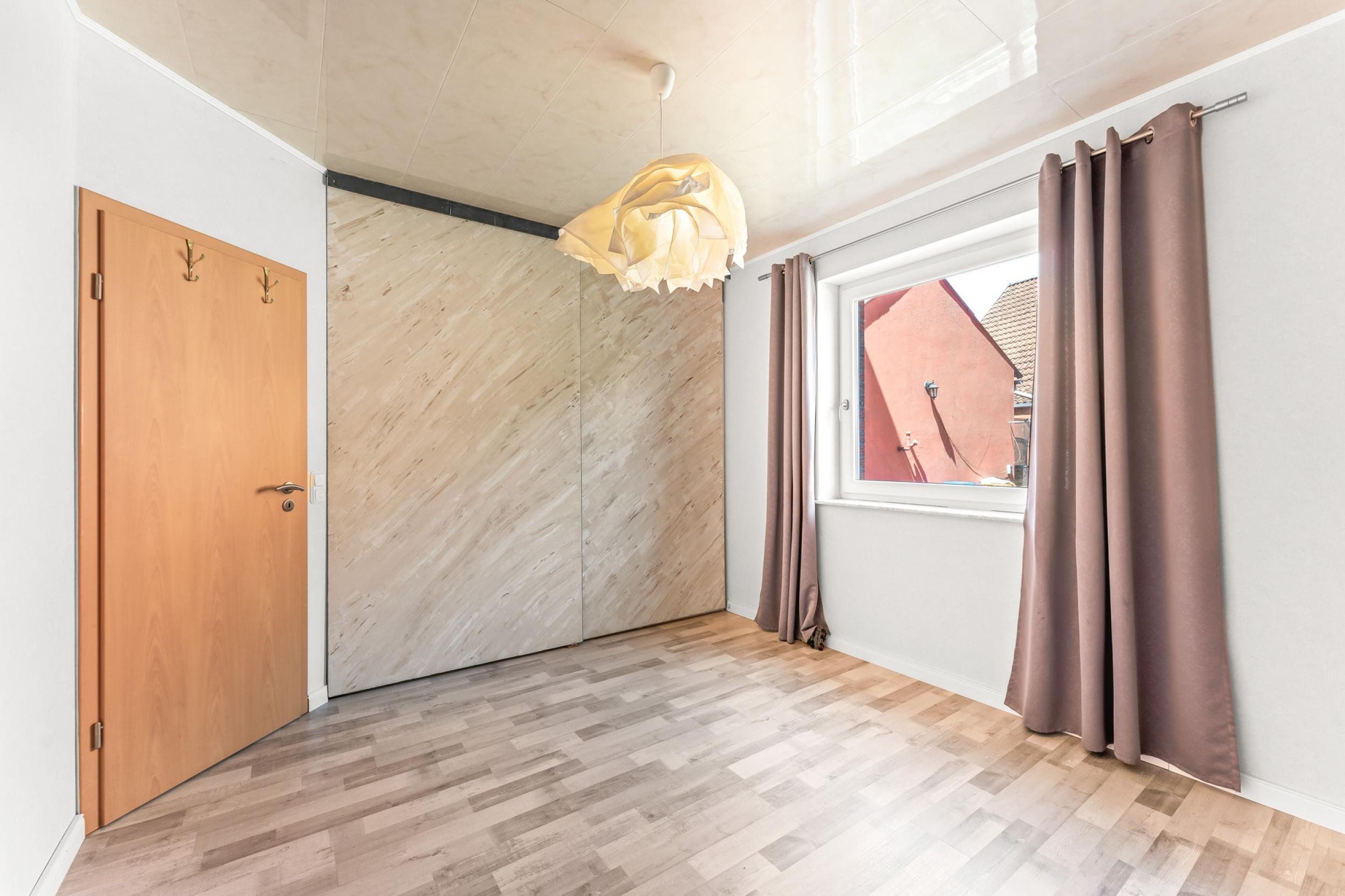 Loxstedt - Modernes KfW-60-Einfamilienhaus mit Erdwärme, Garage und pflegeleichtem Grundstück - Schlafzimmer EG