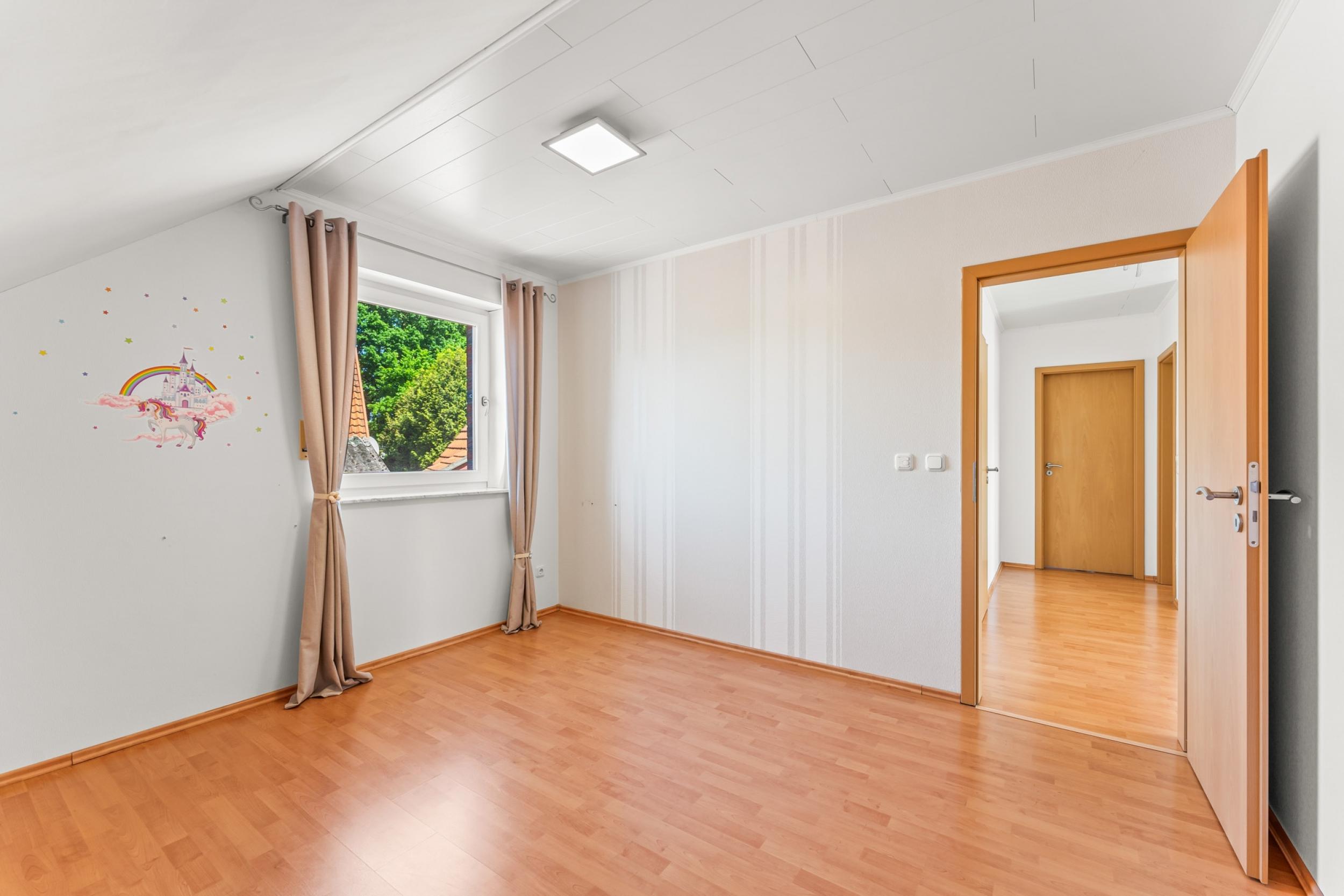 Loxstedt - Modernes KfW-60-Einfamilienhaus mit Erdwärme, Garage und pflegeleichtem Grundstück - Kinder-/Gästezimmer