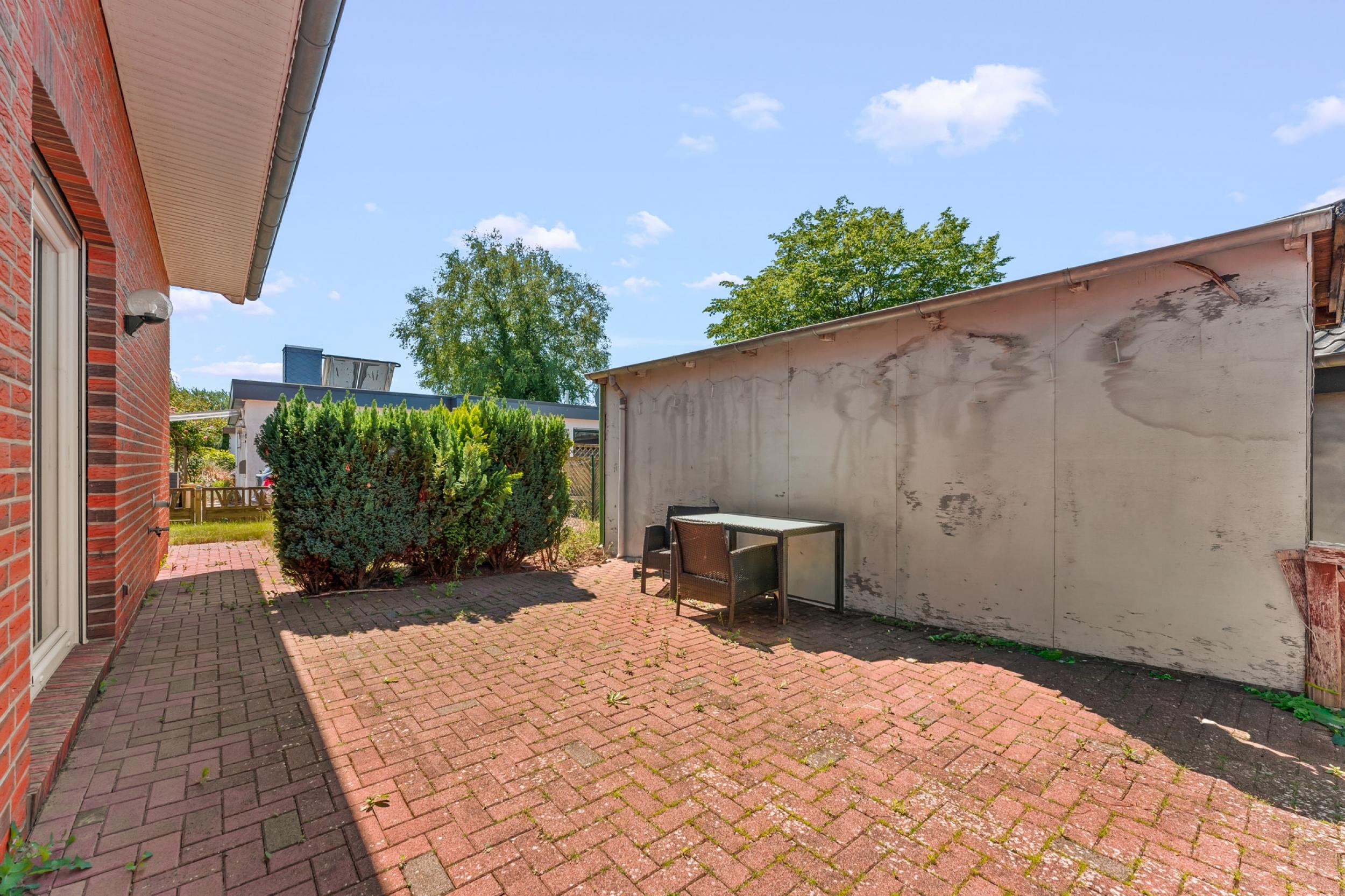 Loxstedt - Modernes KfW-60-Einfamilienhaus mit Erdwärme, Garage und pflegeleichtem Grundstück - Terrasse