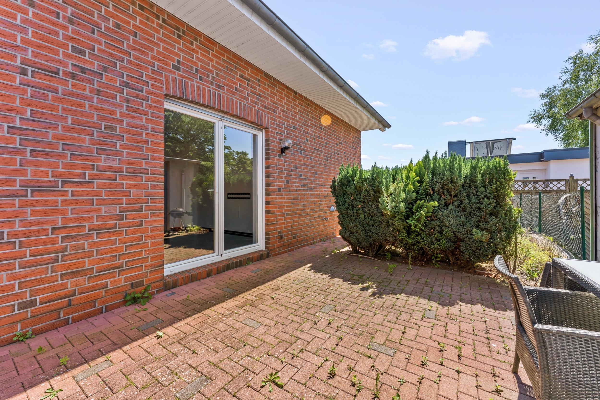 Loxstedt - Modernes KfW-60-Einfamilienhaus mit Erdwärme, Garage und pflegeleichtem Grundstück - Terrasse