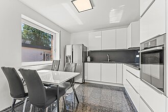 Loxstedt - Modernes KfW-60-Einfamilienhaus mit Erdwärme, Garage und pflegeleichtem Grundstück - Küche