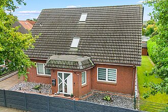 Surheide - Ein- bis Zweifamilienhaus in attraktiver Lage - Frontansicht