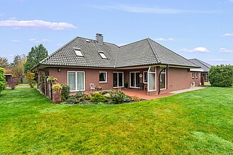 Beverstedt - Repräsentativer Winkelbungalow in ruhiger Wohnlage – ein Zuhause zum Wohlfühlen - Rückansicht