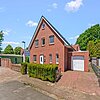 Loxstedt - Modernes KfW-60-Einfamilienhaus mit Erdwärme, Garage und pflegeleichtem Grundstück - Frontansicht