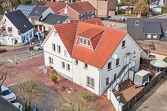 Loxstedt - Lichtdurchflutete 3-Zimmer-Maisonettewohnung im Ortszentrum - Außenansicht