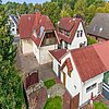 Schiffdorf - Modernisiertes Einfamilienhaus mit zusätzlichem Bauland - Vogelperspektive 