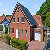 Loxstedt - Modernes KfW-60-Einfamilienhaus mit Erdwärme, Garage und pflegeleichtem Grundstück - Frontansicht
