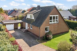 Schiffdorf - Familienfreundliches Einfamilienhaus in traumhafter Lage - Titelbild