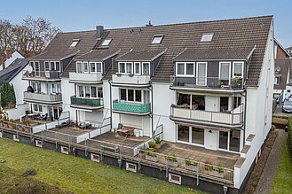 Burglesum - Attraktive Hochparterrewohnung mit großer Sonnenterrasse - Titelbild