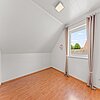 Loxstedt - Modernes KfW-60-Einfamilienhaus mit Erdwärme, Garage und pflegeleichtem Grundstück - Kinder-/Gästezimmer