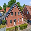 Loxstedt - Modernes KfW-60-Einfamilienhaus mit Erdwärme, Garage und pflegeleichtem Grundstück - Frontansicht