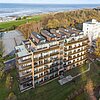 Döse - Renditestarke Ferienwohnung direkt am Nordseestrand - Rückansicht